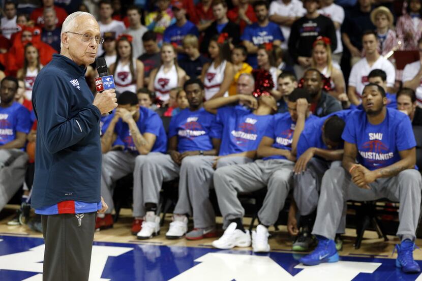 Southern Methodist Mustangs head coach Larry Brown gives a speech after the team did not...