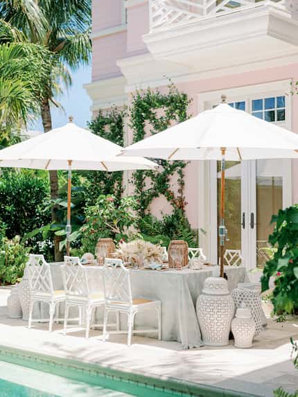 Add shade to an uncovered patio with stylish umbrellas, as seen in this home featured in A...