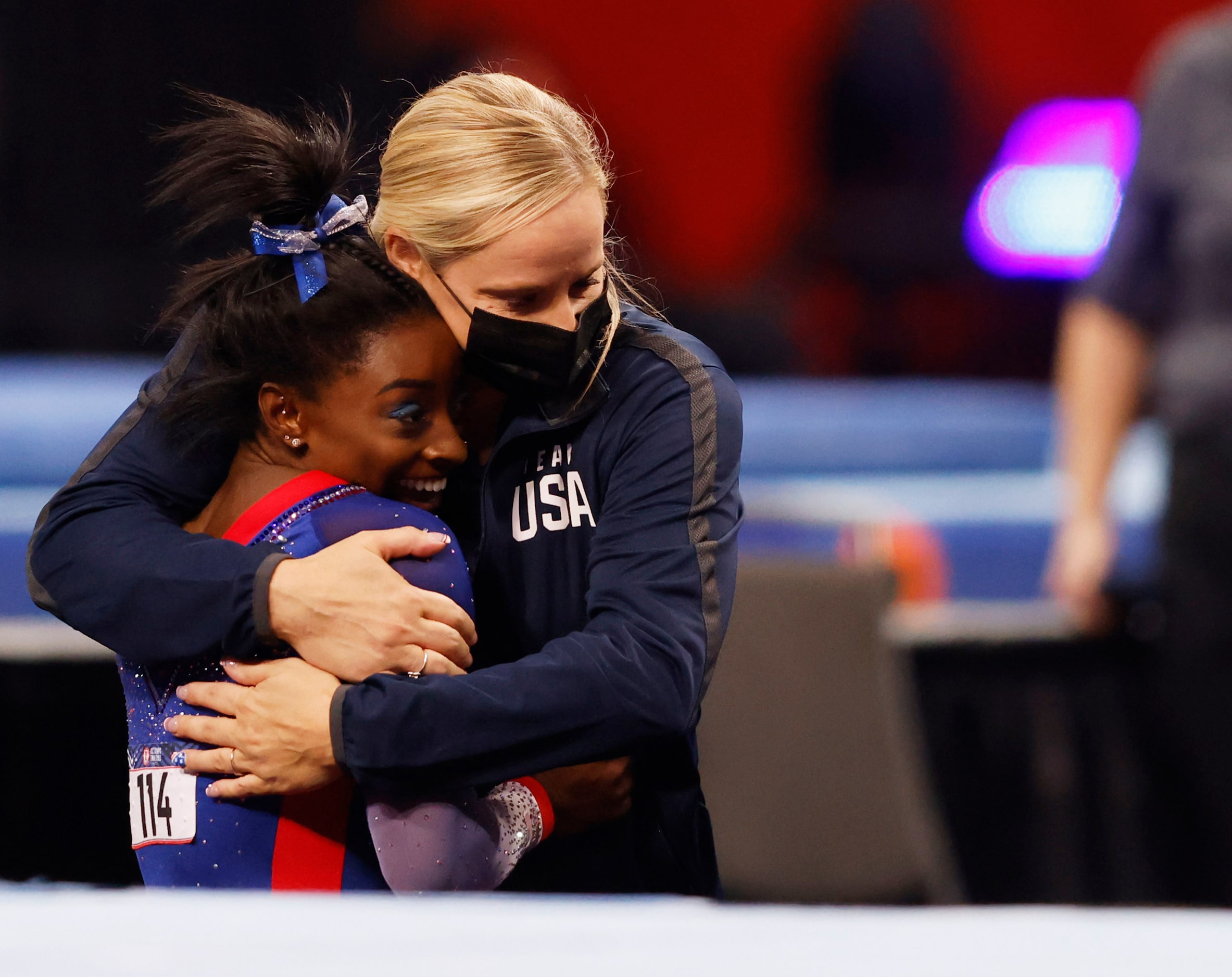 Simone Biles of World Champions hugs her coach coach Cecile Landi after competing in the...