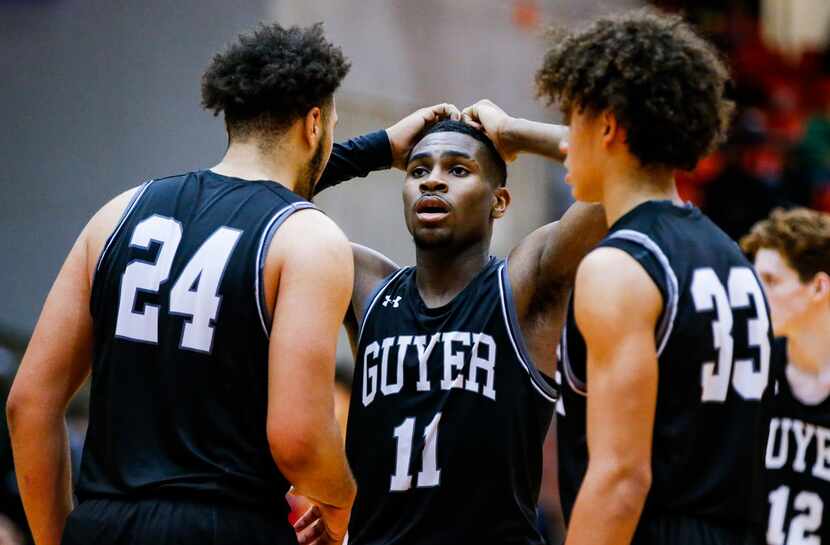 Denton Guyer senior guard De'Vion Harmon (11) reacts to missing a free-throw as his...