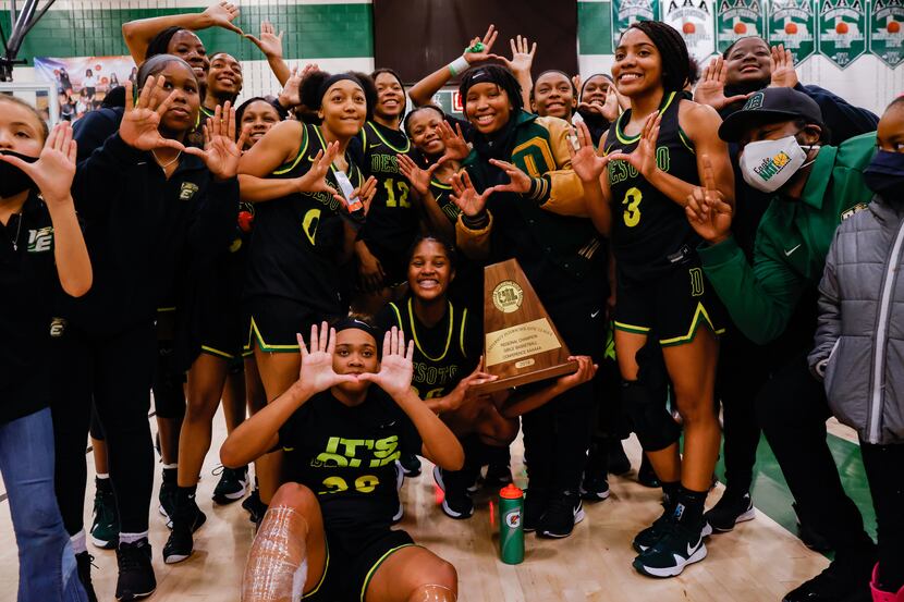 DeSoto celebrates their win against Duncanville following a girls basketball Class 6A Region...