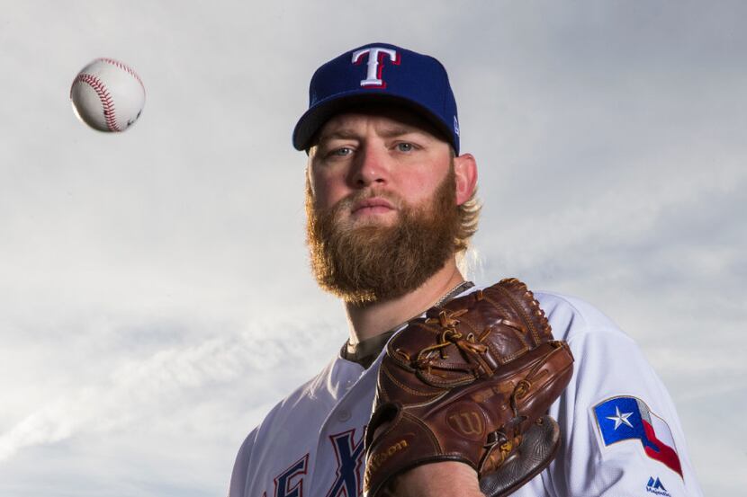 Texas Rangers starting pitcher Andrew Cashner (54) poses for a portrait on photo day during...