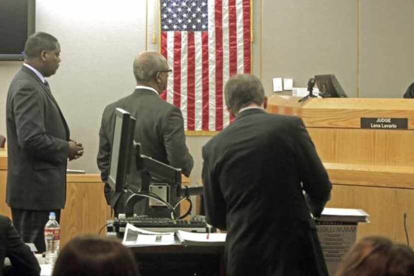 Dallas County District Attorney Craig Watkins (left) appeared before State District Judge...