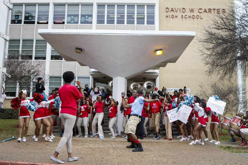 Students celebrate a donation at Carter High School in Dallas in 2015. (The Dallas Morning...