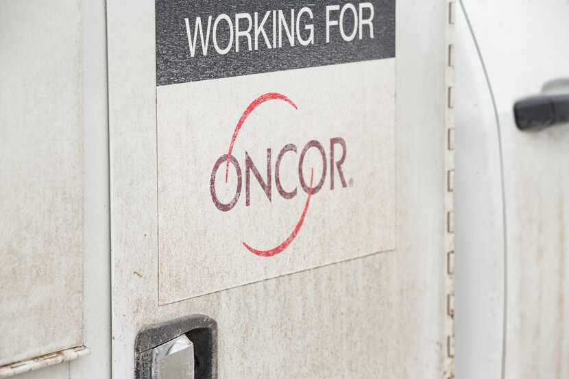 An Oncor contractor truck parked at Walmart in Arlington on Tuesday, Feb. 16, 2021. As power...