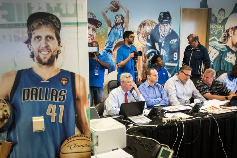 Seated at table from left, Dallas Mavericks Assistant General Manager Keith Grant,  Director...