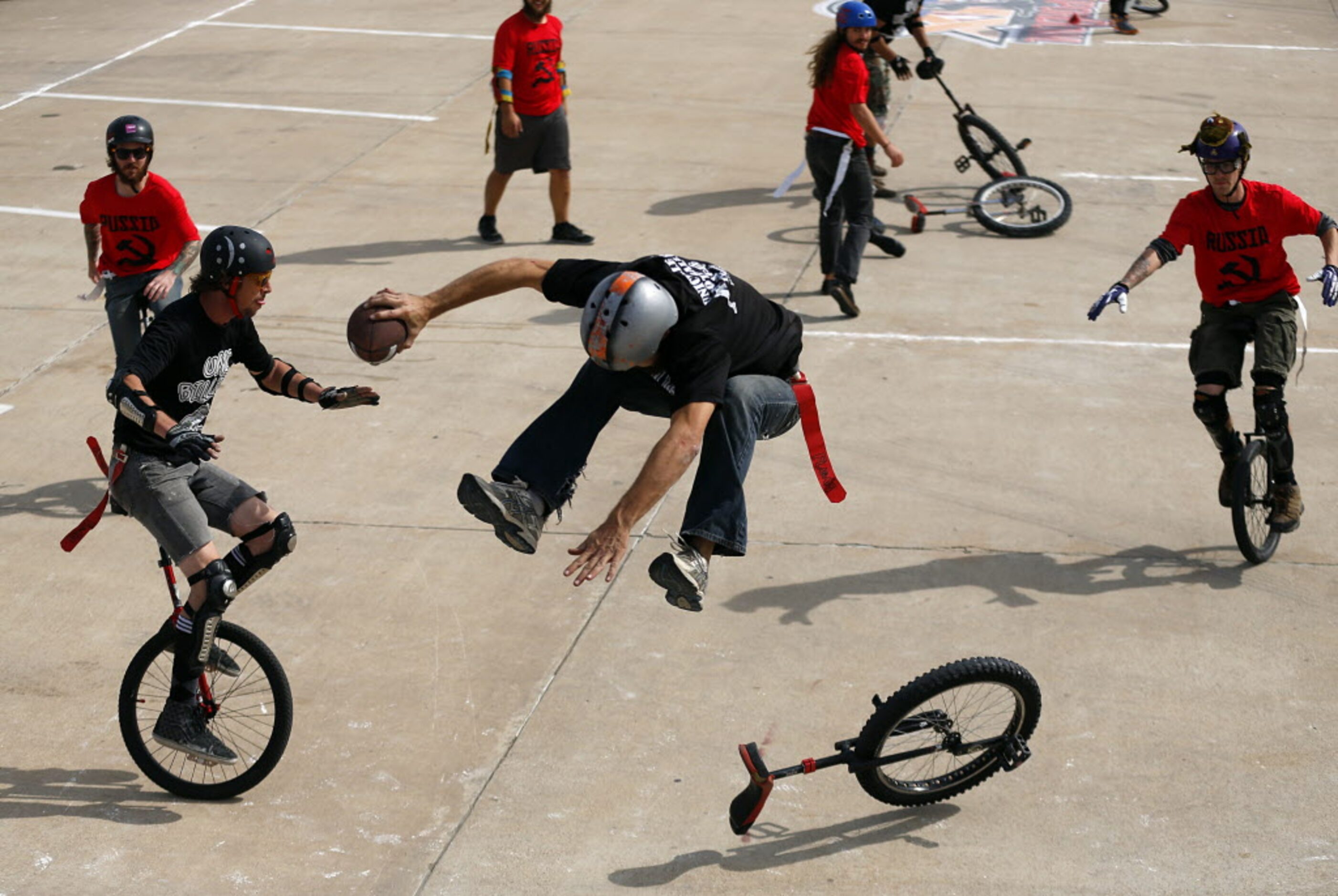 Uni Billies Chance 'Crazy Horse' Whited leaps off his unicycle in celebration of his second...