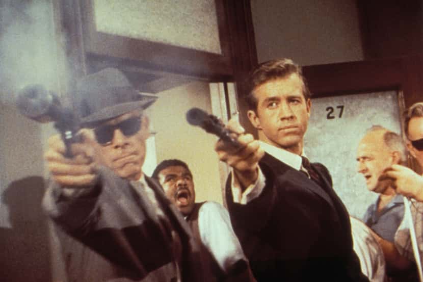 Lee Marvin and Clu Gulager take their shots in the 1964 version of The Killers. (Criterion) 