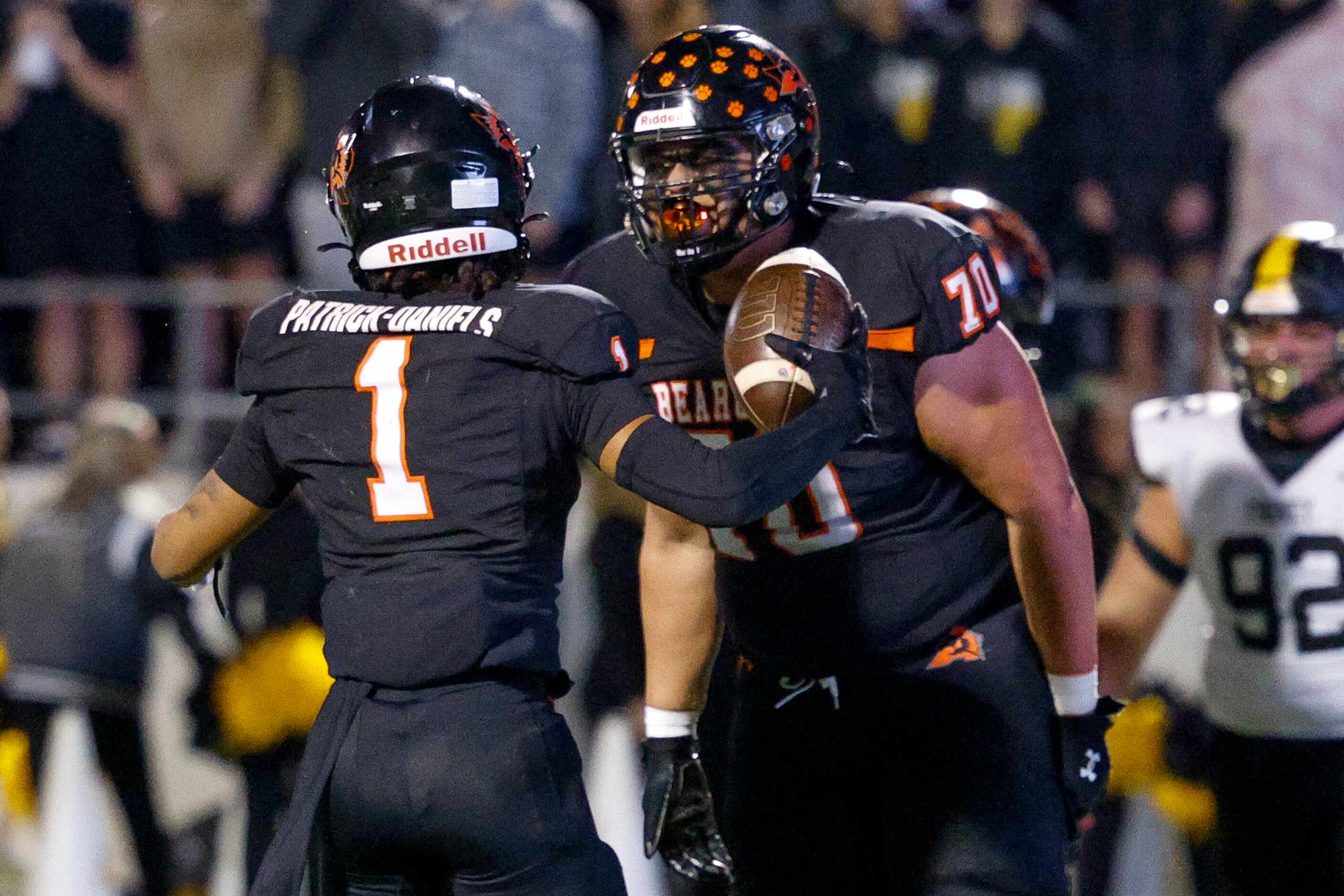 Aledo running back Hawk Patrick-Daniels (1) celebrates his rushing touchdown with offensive...