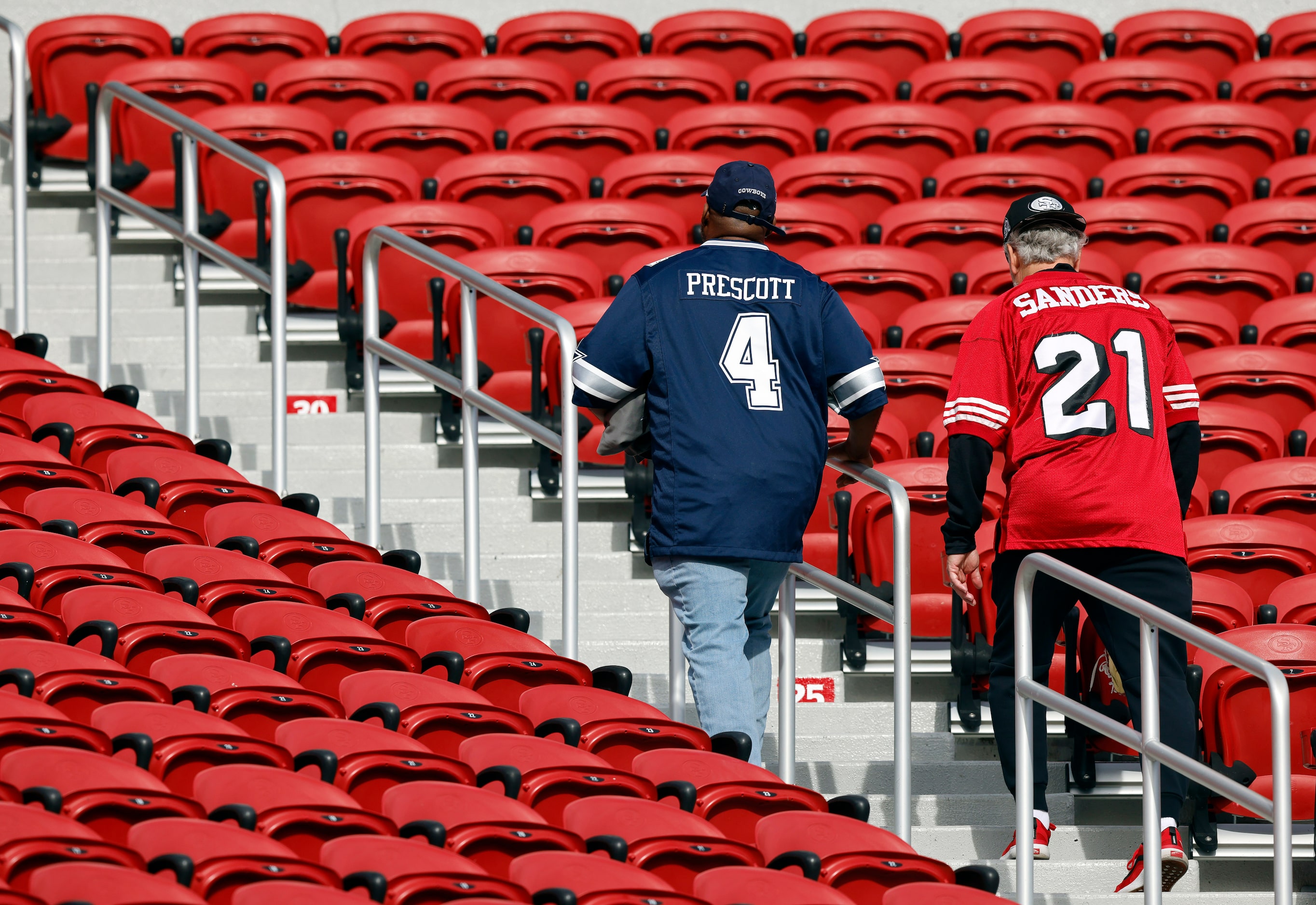 A Dallas Cowboys and San Francisco 49ers fan arrive for the game at Levi's Stadium in Santa...