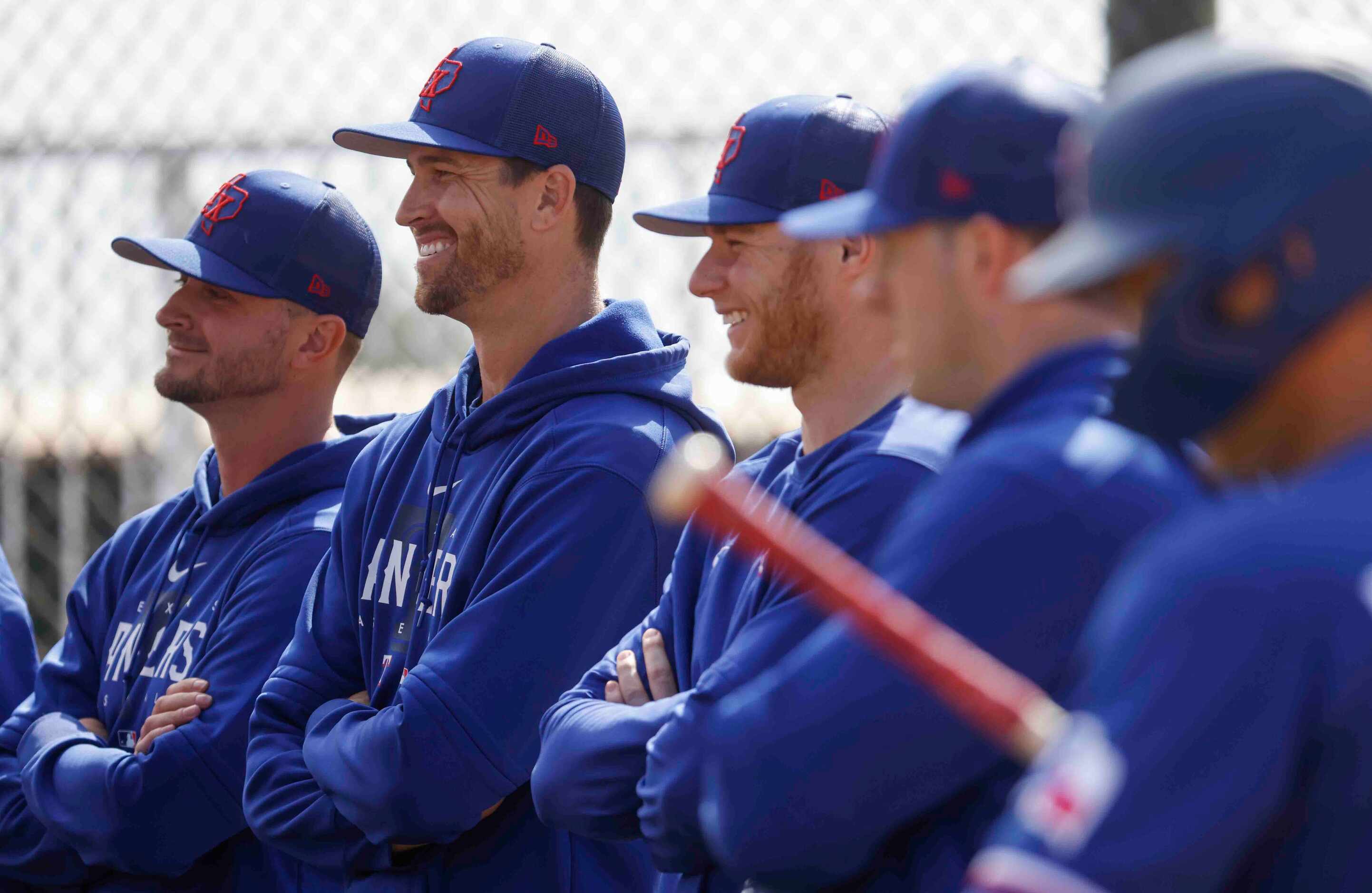 From left, Texas Rangers pitchers Jake Odorizzi, Jacob deGrom, and Zak Kent observe a...
