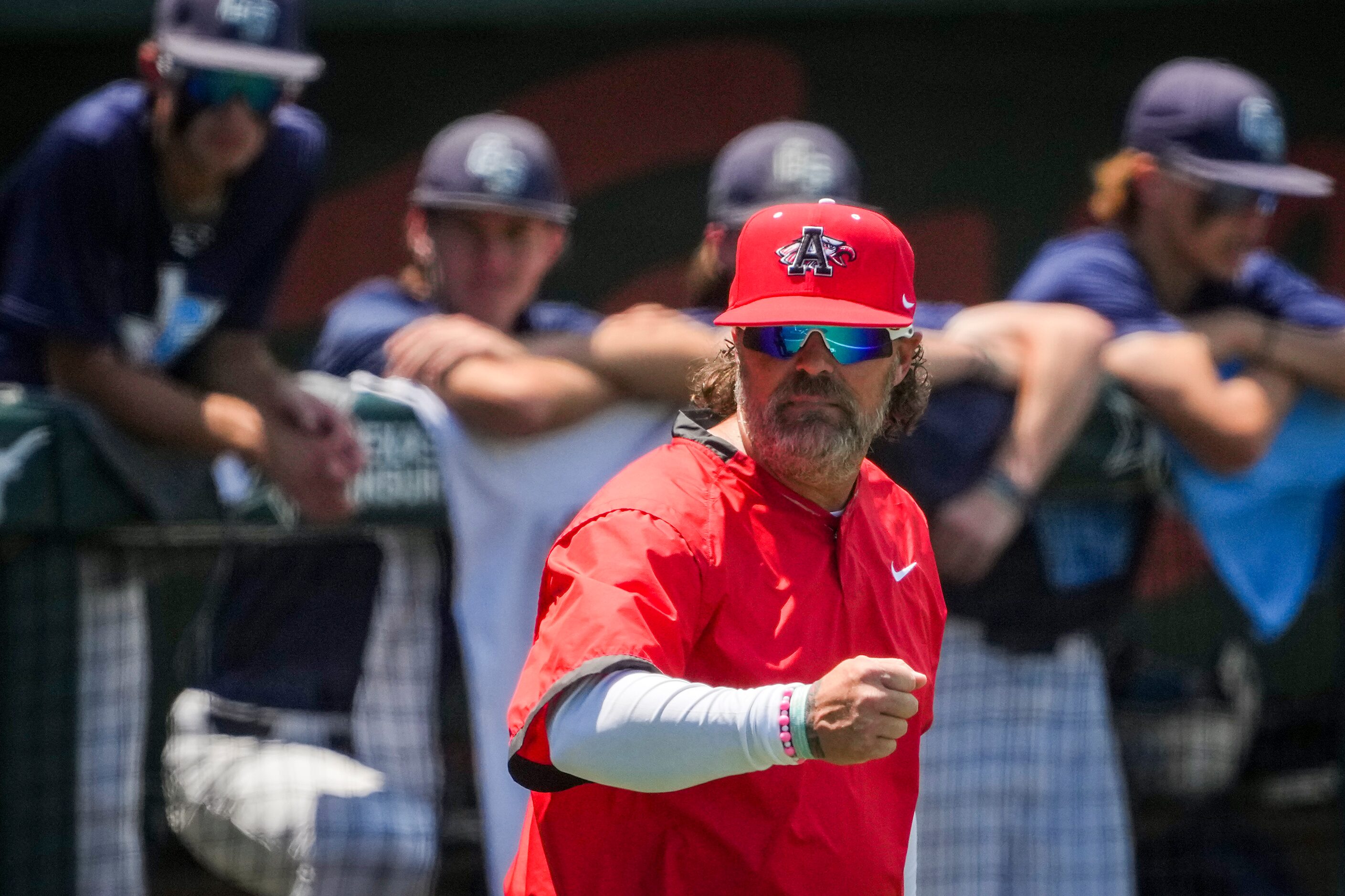 Argyle head coach Ricky Griffin motions to his dugout during the sixth inning of a UIL 4A...