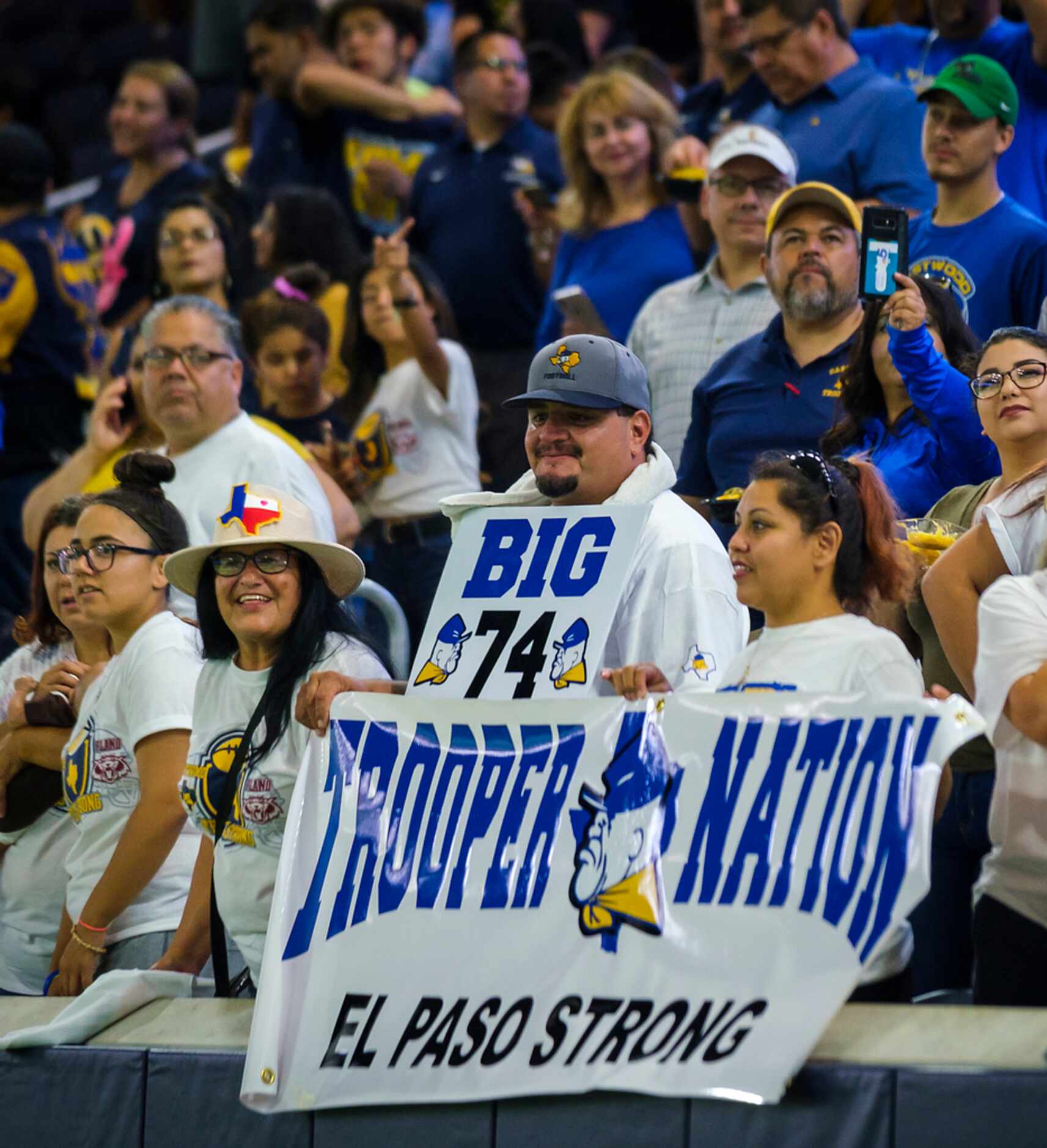 El Paso Eastwood High School fans cheer their team before a football game against the Plano...