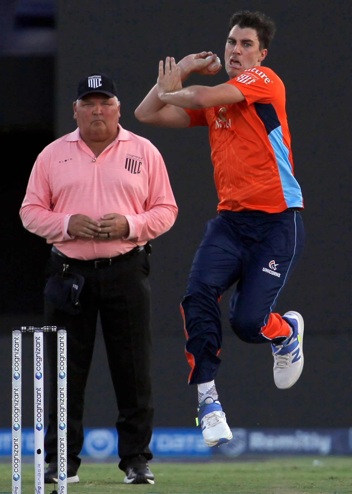 San Francisco Unicorns bowler Patrick Cummins (30) races to deliver the ball to a Washington...