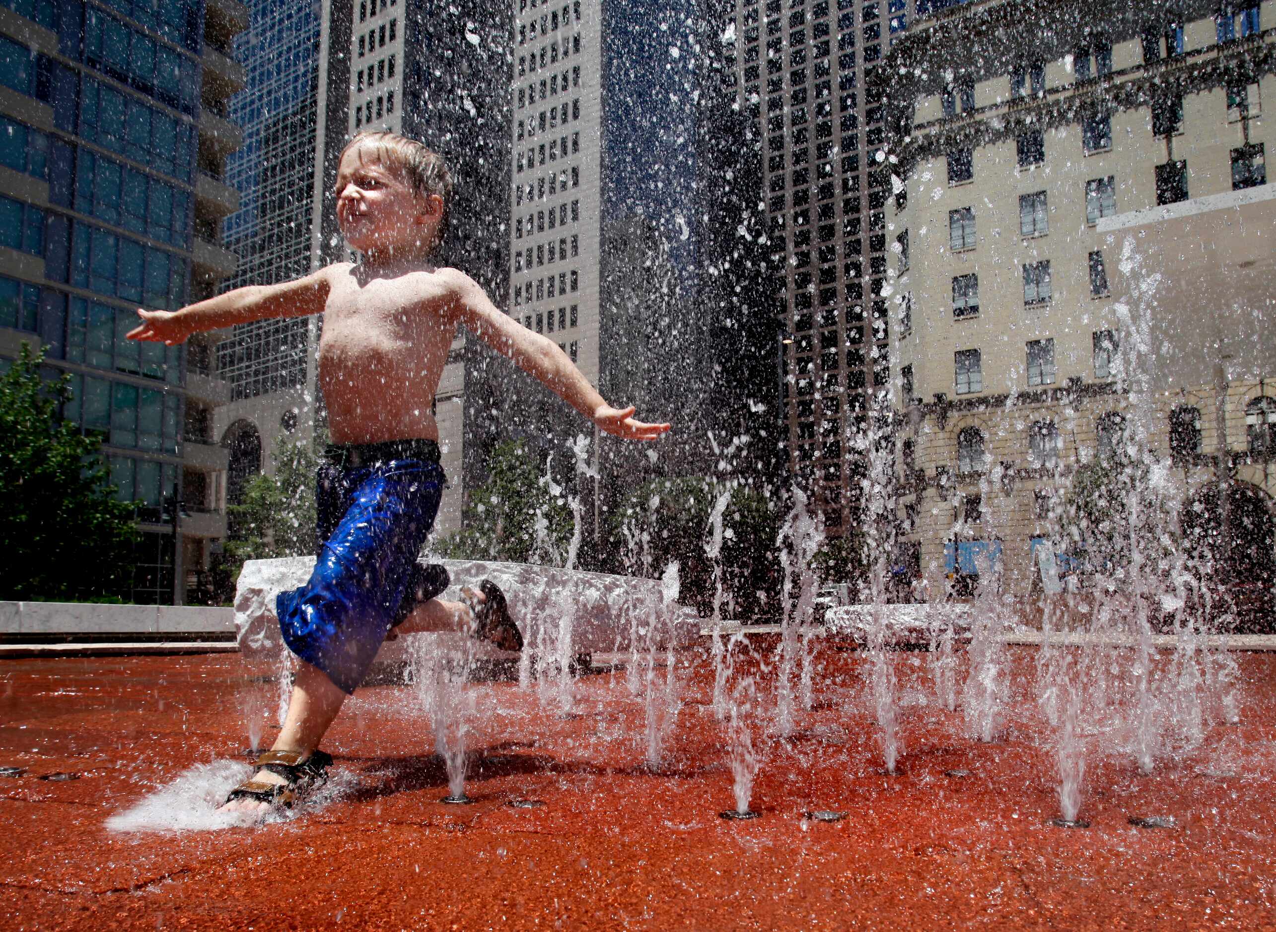 As temperatures climbed into the triple digits again in North Texas, Sam Posey, 4, found the...