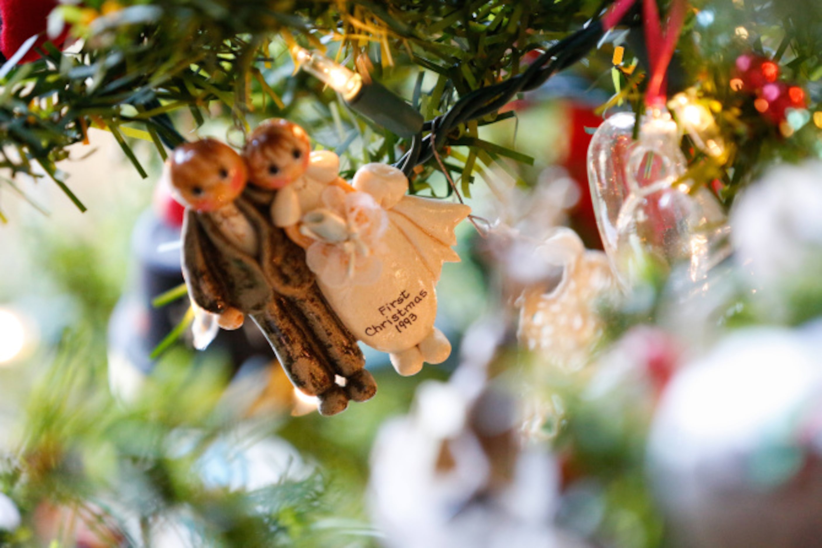 A First Christmas ornament hangs on Lisa and Jason Druebert's Christmas tree.