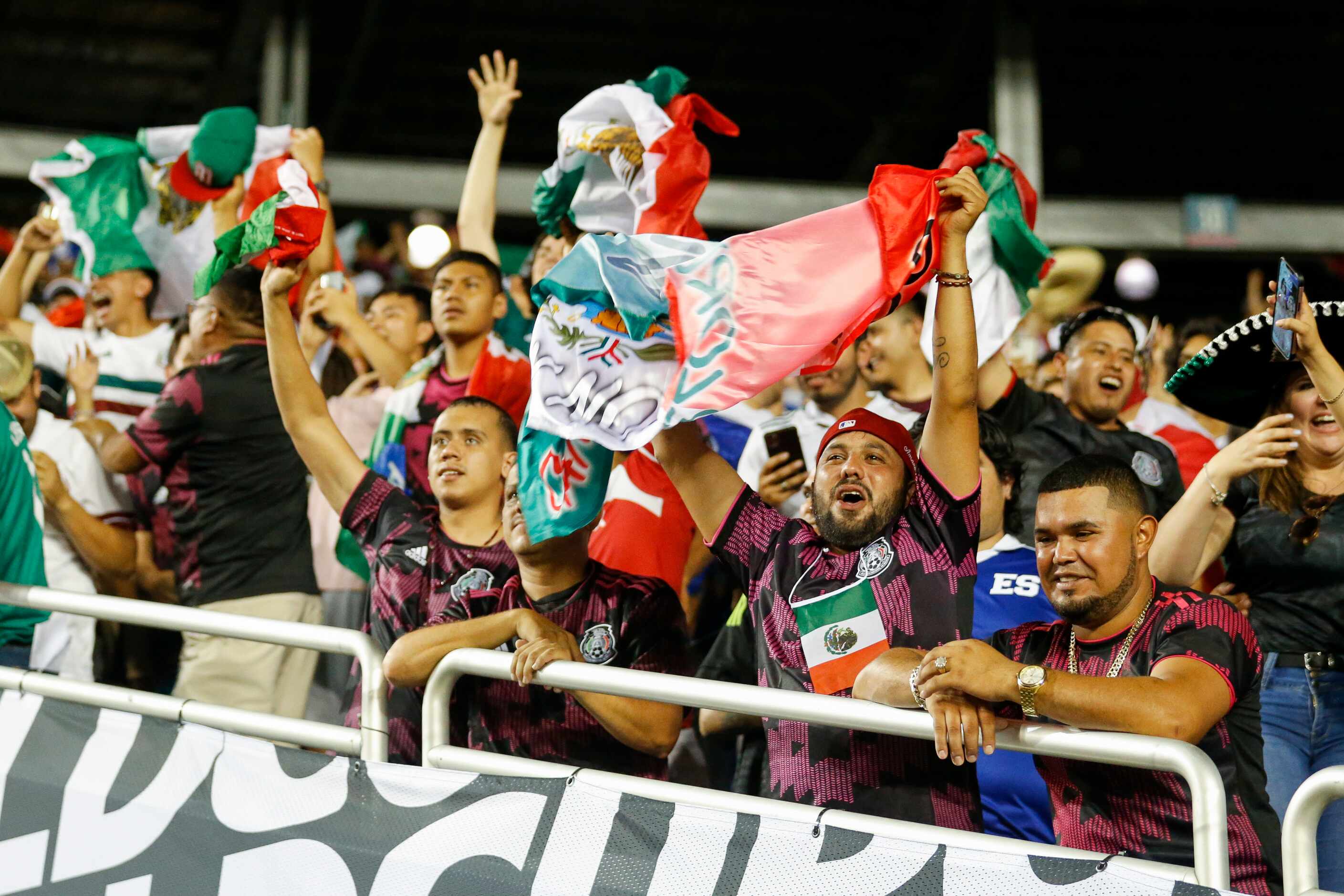 Fans of Mexico celebrate after a goal by Mexico defender Luis Rodríguez (21) during the...