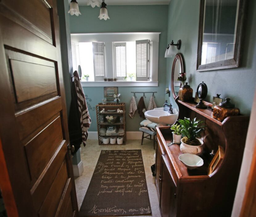 The upstairs guest bathroom of Jackie and Doug Sweat's home on Junius Street in Munger Place...