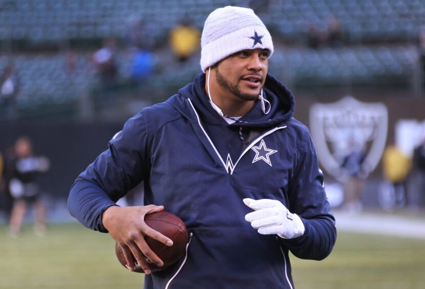 Dallas Cowboys quarterback Dak Prescott (4) warms up before the Dallas Cowboys vs. the...