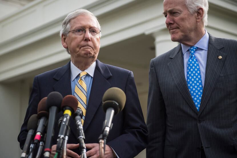 Senate Majority Leader Mitch McConnell, left, and Senate Majority Whip Sen. John Cornyn of...