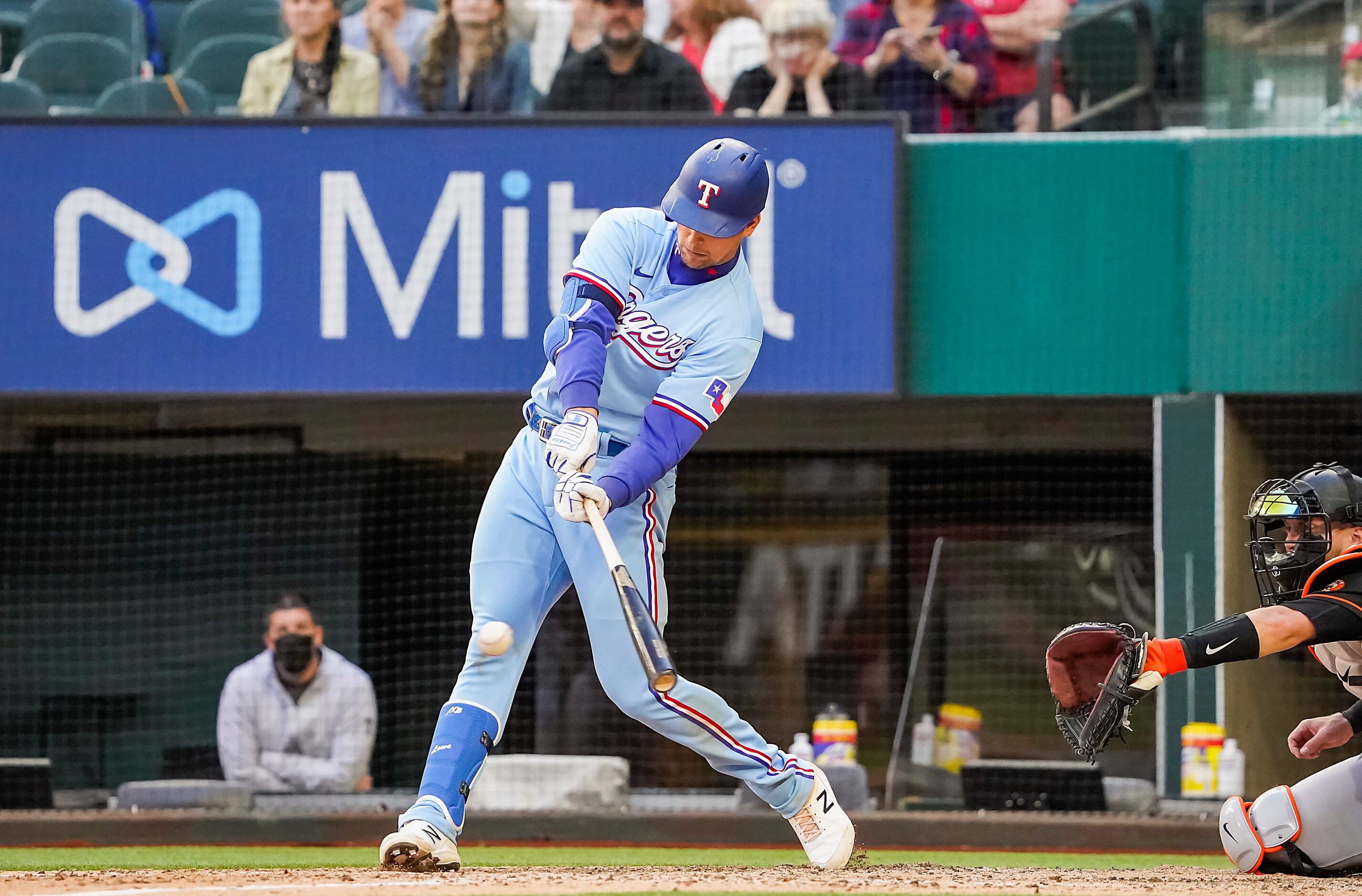 Texas Rangers first baseman Nate Lowe hits a walk-off single during the tenth inning of the...