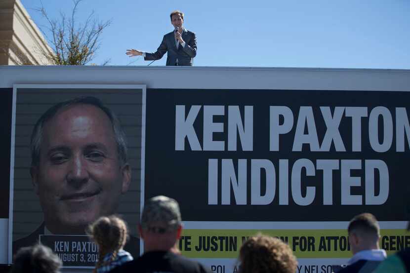 Justin Nelson, who is attempting to unseat Texas Attorney General Ken Paxton, speaks to a...