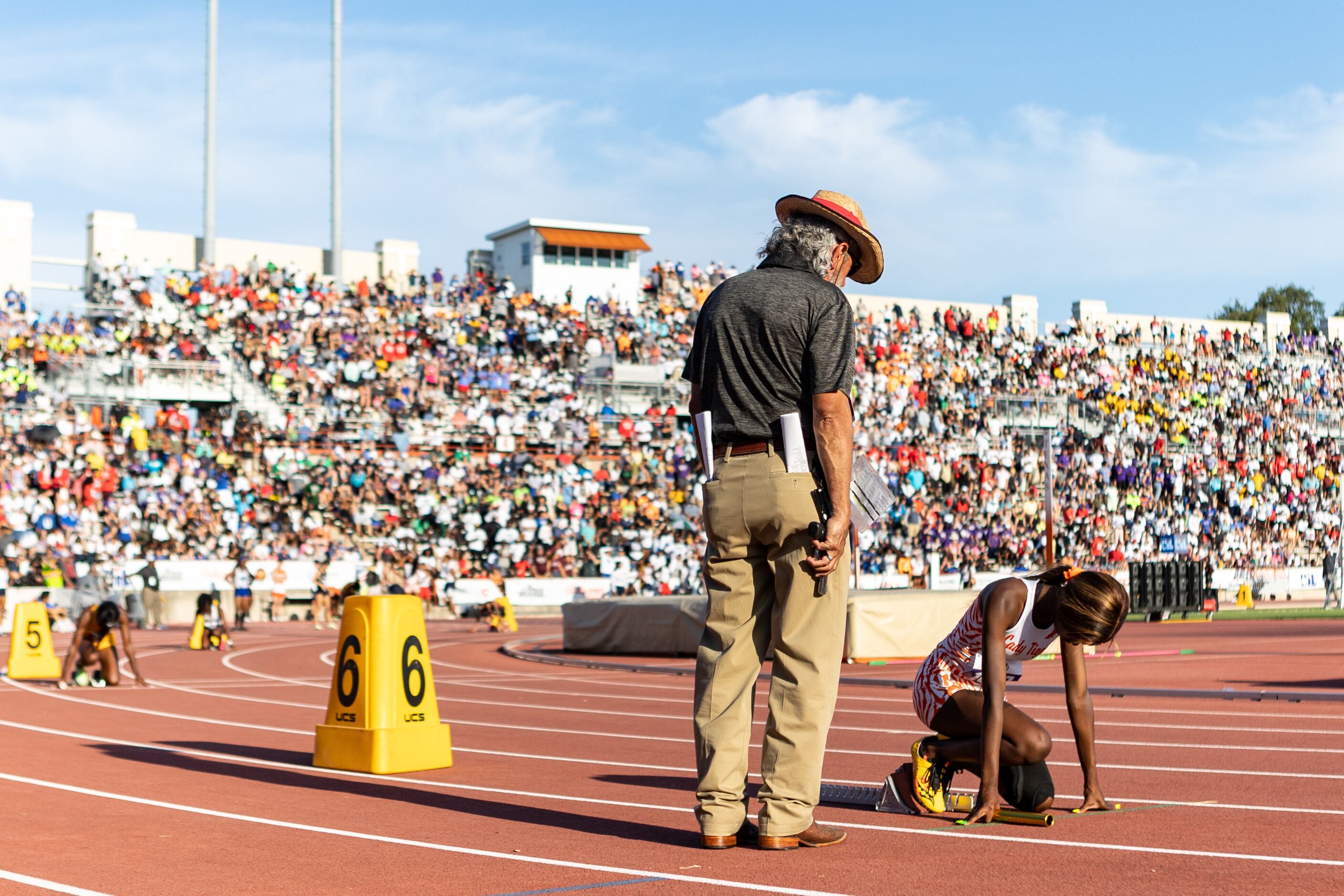 Leeira Williams prepares to lead off the girls’ 4x200 relay for Lancaster at the UIL Track &...