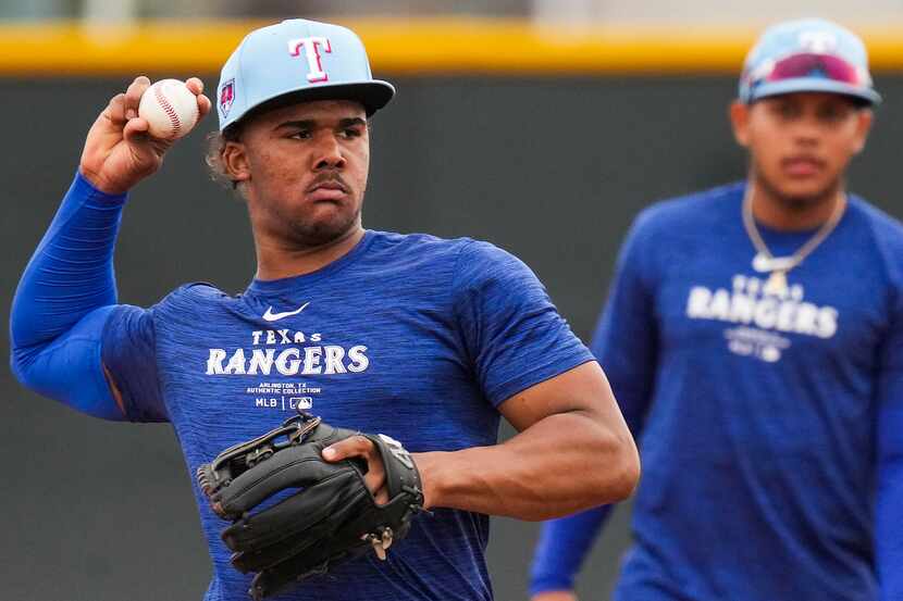Texas Rangers minor league infielder Gleider Figuereo participates in a spring training...