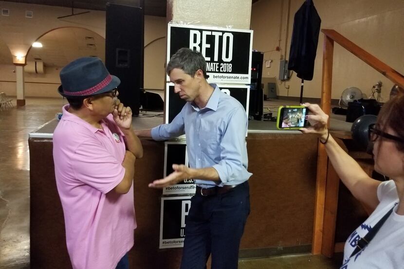 Rep. Beto O'Rourke speaks with restaurateur Martin Gonzalez during a campaign stop in Odessa...