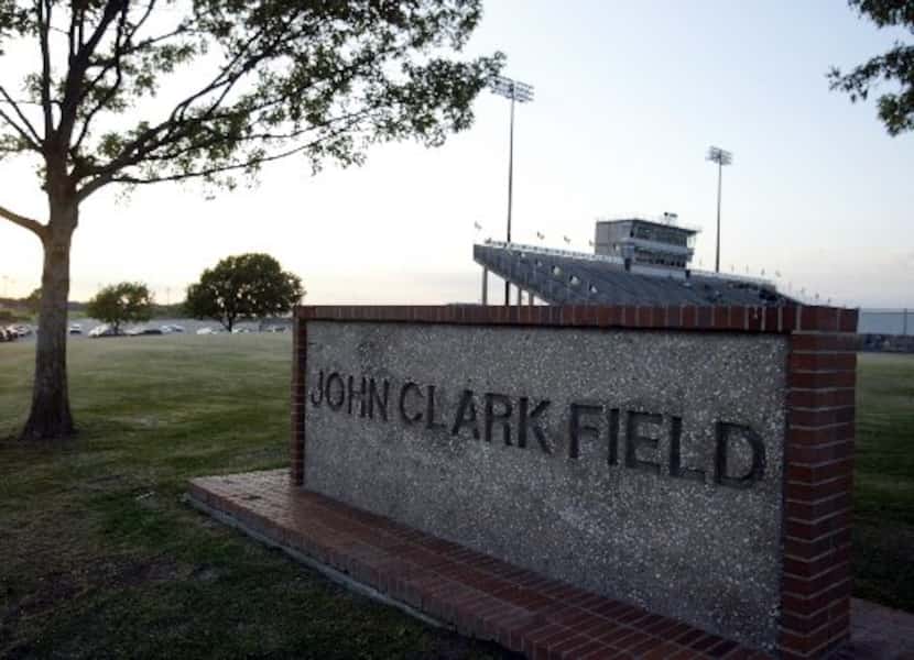 A marker in front of the football stadium at John Clark Field in Plano. A new sign on the...