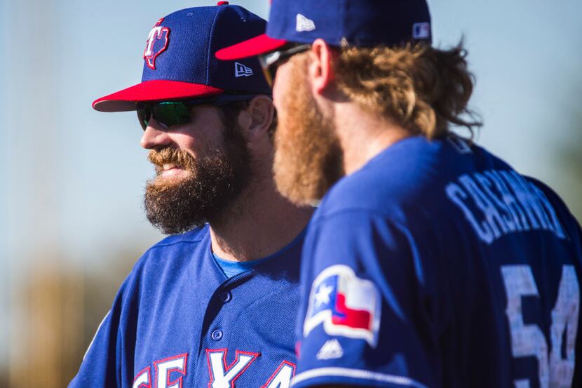 Texas Rangers starting pitcher Cole Hamels (35) chats with starting pitcher Andrew Cashner...