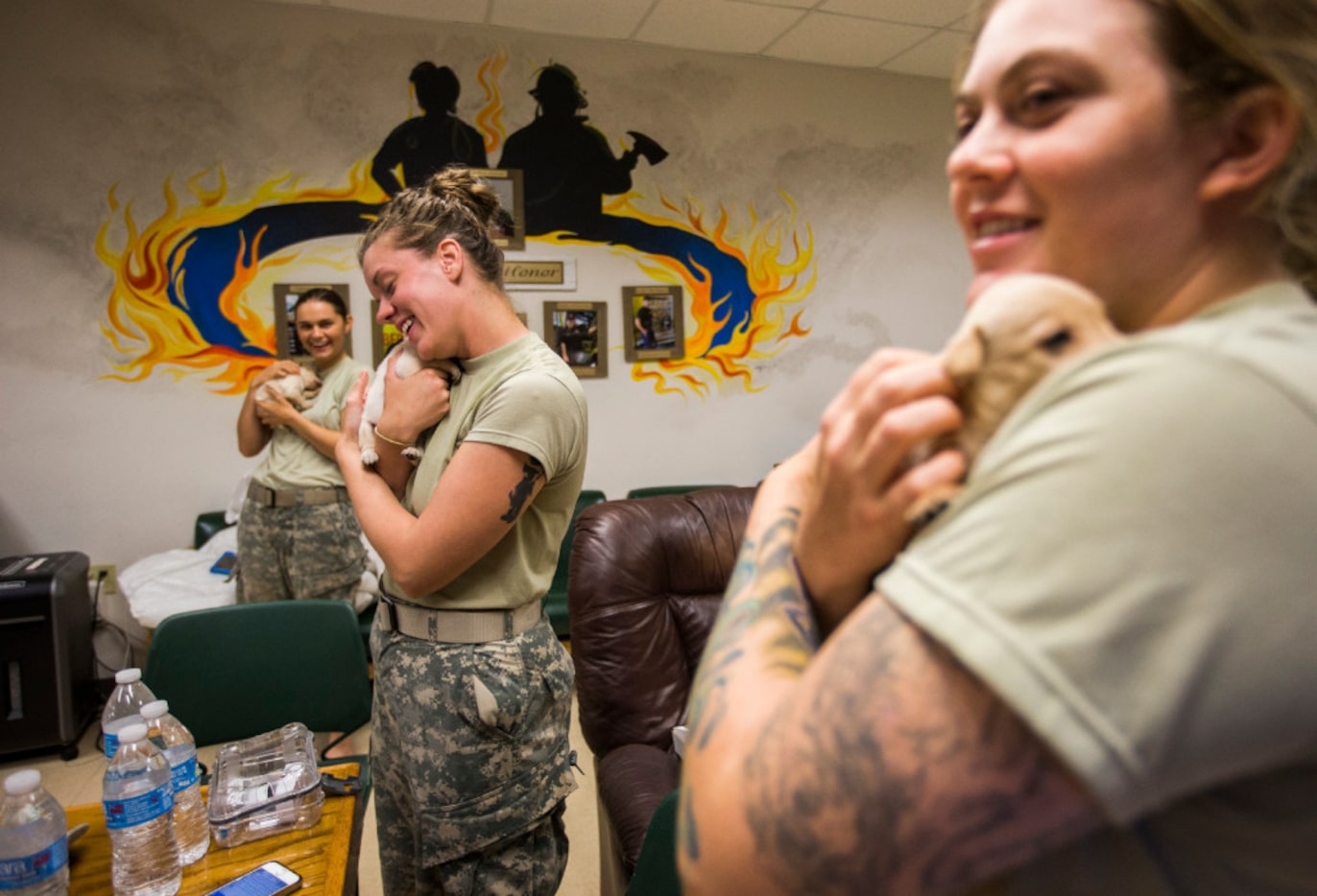 National Guard troops from left, Private First Class Taylor Garen, Specialist Kyleigh Neese...