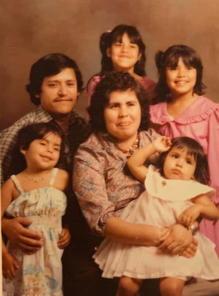 Mother Delfina Lira Negrete and father Camerino Lira in a family photograph with their...