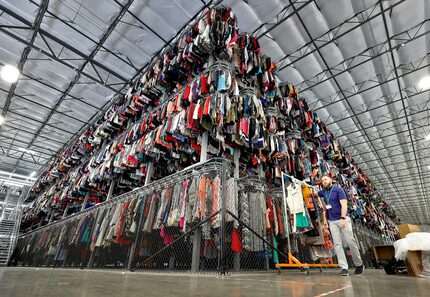 A thredUP sorting facility in Phoenix shows some of the thousands of garments in its inventory.