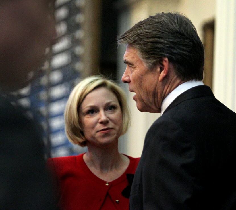  Rep. Sarah Davis, R-West University Place, is pictured here talking to former Gov. Rick...