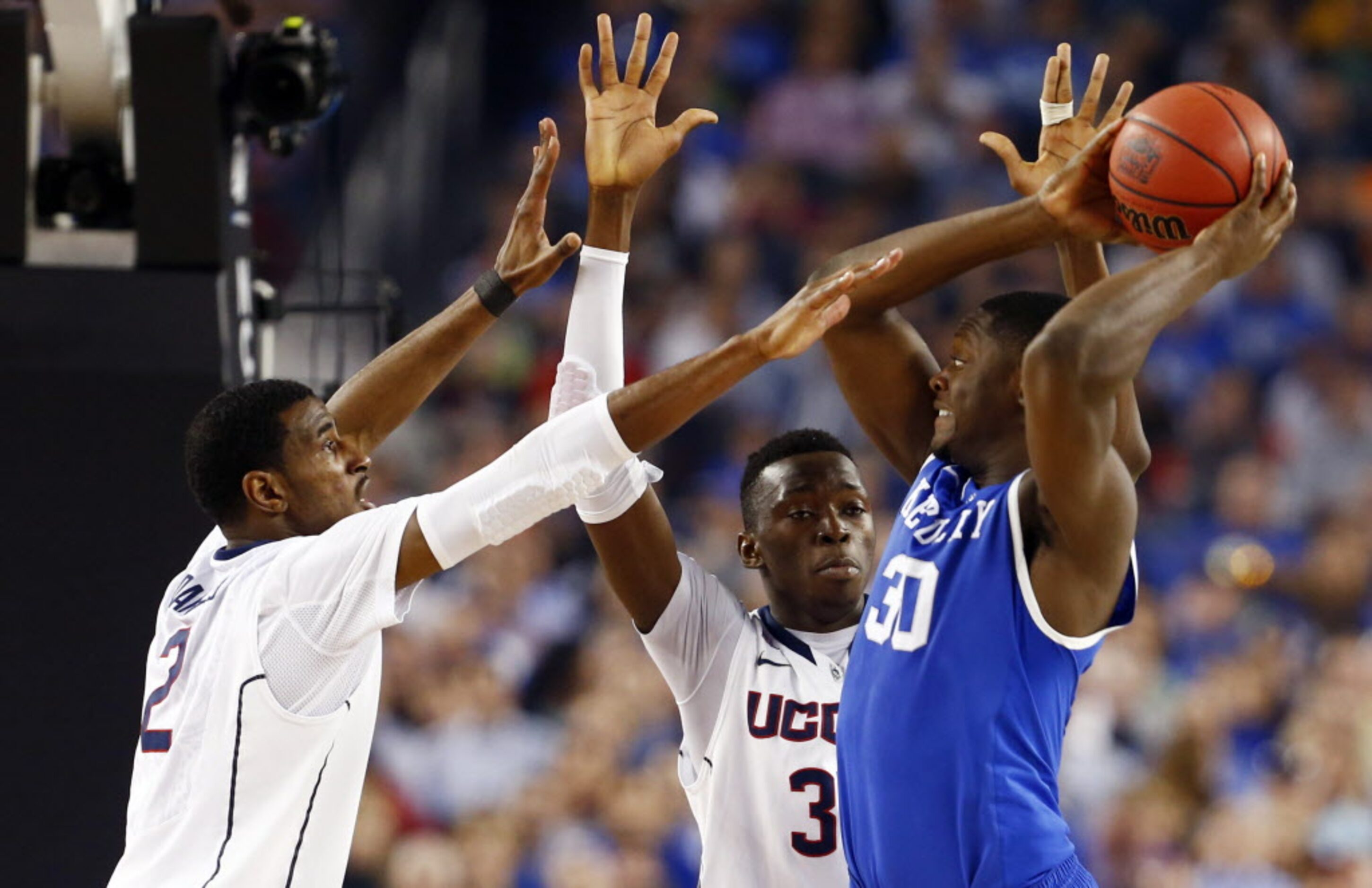 Connecticut Huskies forward DeAndre Daniels (2) and Connecticut Huskies center Amida Brimah...