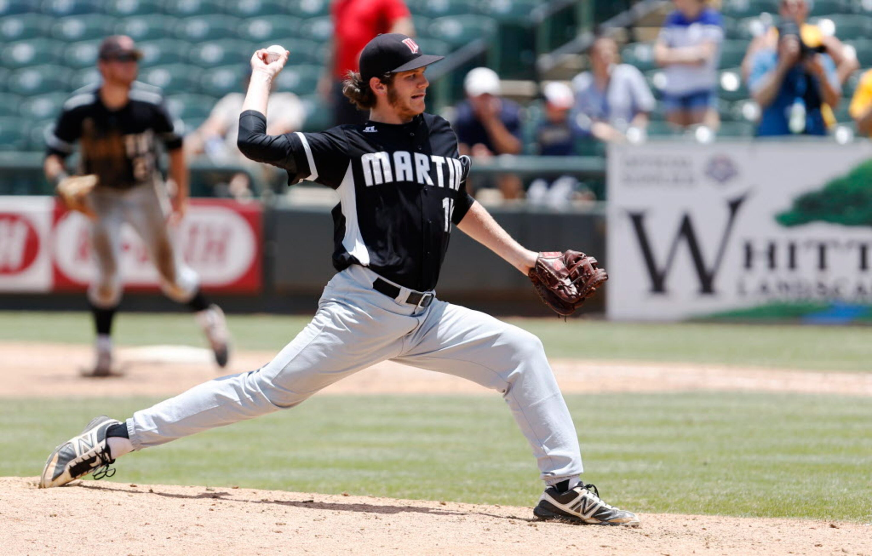 Martin's Conner LIdiak (14) pitches in a game against Cypress Ranch during the seventh...