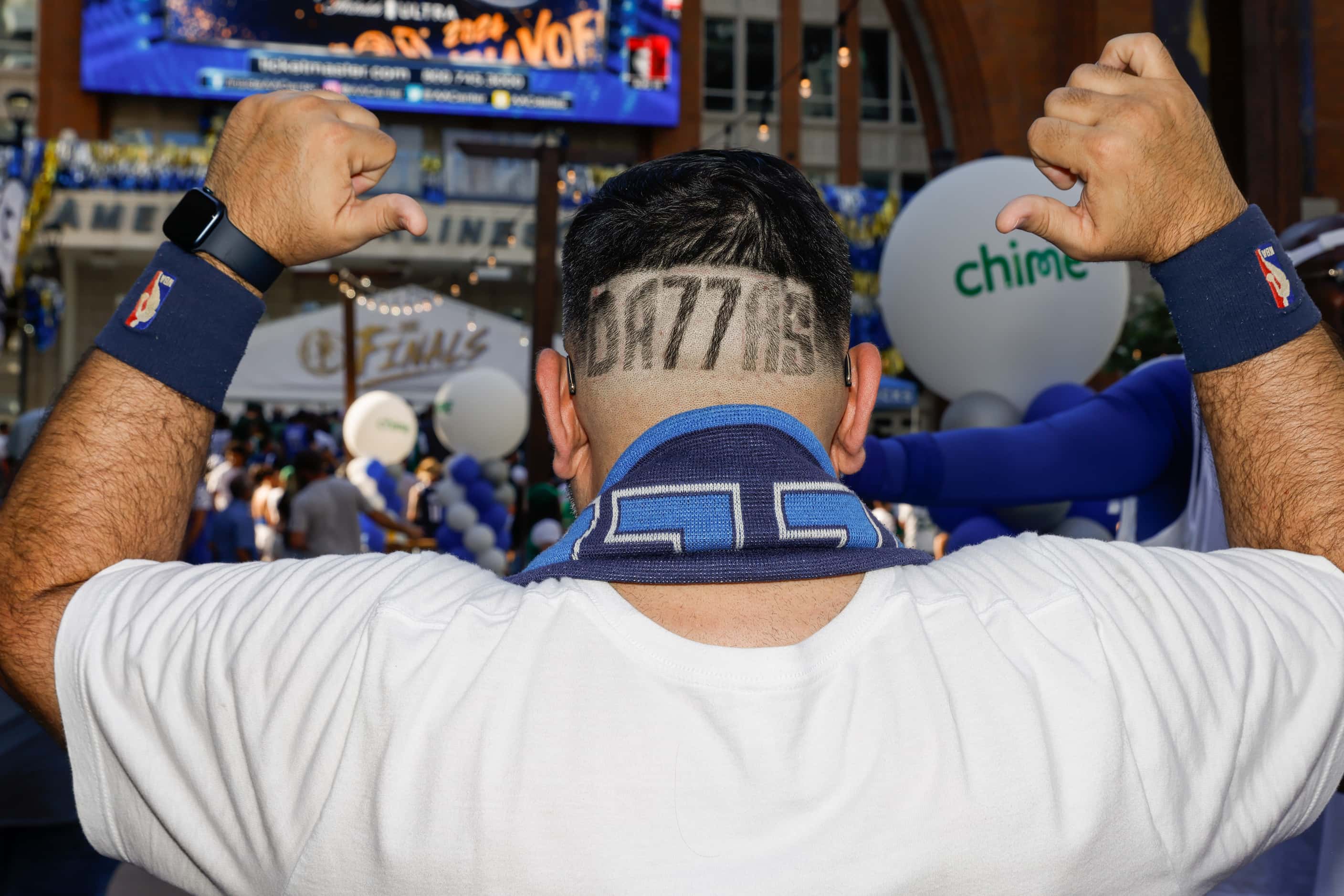 Dallas Mavericks ManiAAC “Don Julio” shows off his Dallas haircut before Game 4 of the NBA...