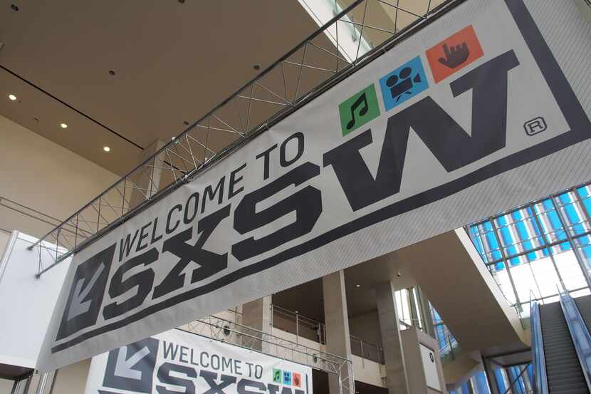 In this file photo taken on March 7, 2012 banners hang in the atrium of the Austin...