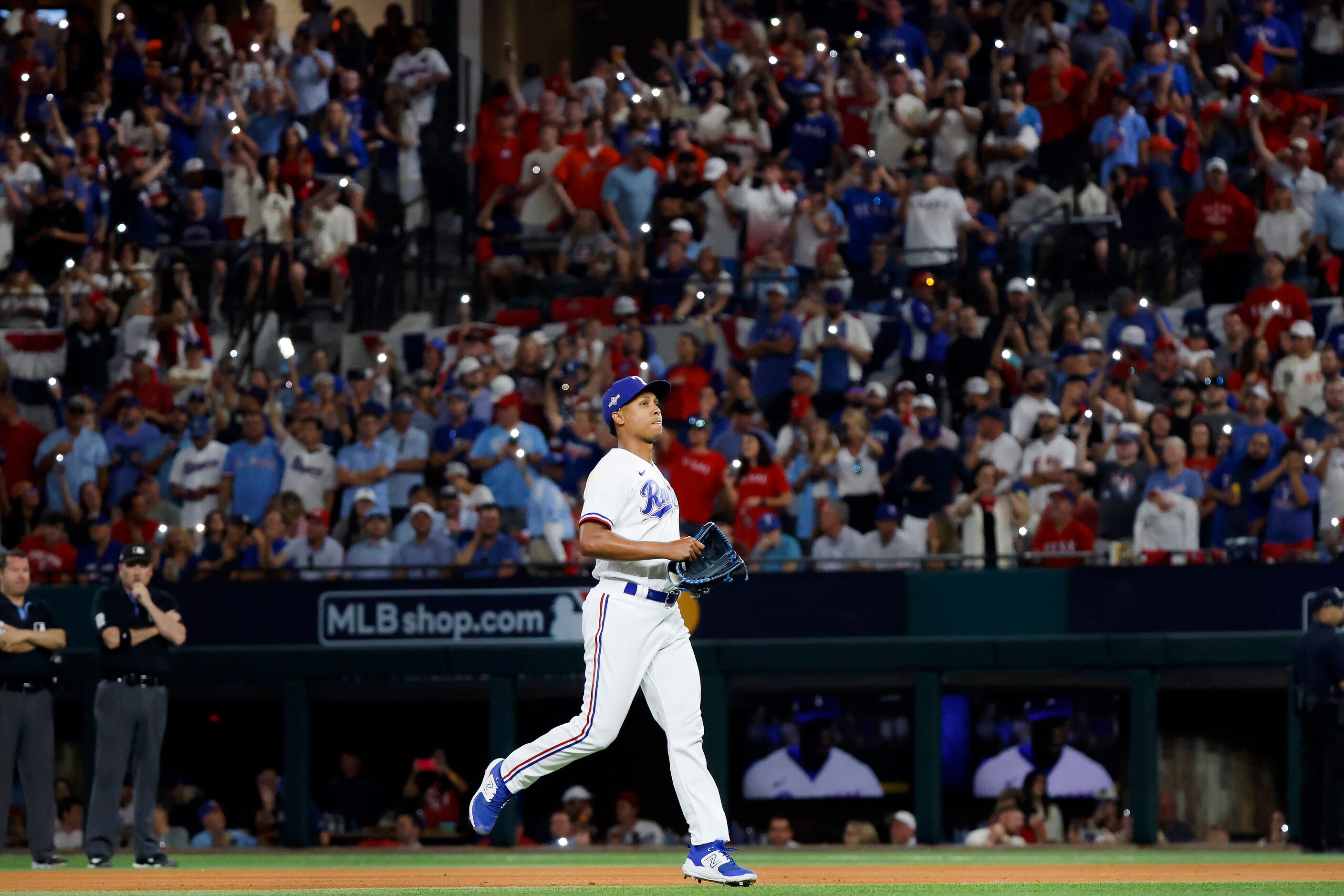 Texas Rangers relief pitcher Jose Leclerc comes into relieve pitcher Aroldis Chapman during...