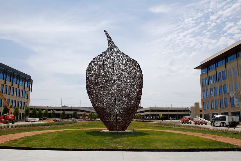 An art installation of a leaf at the Cypress Waters development. Brinker International is...