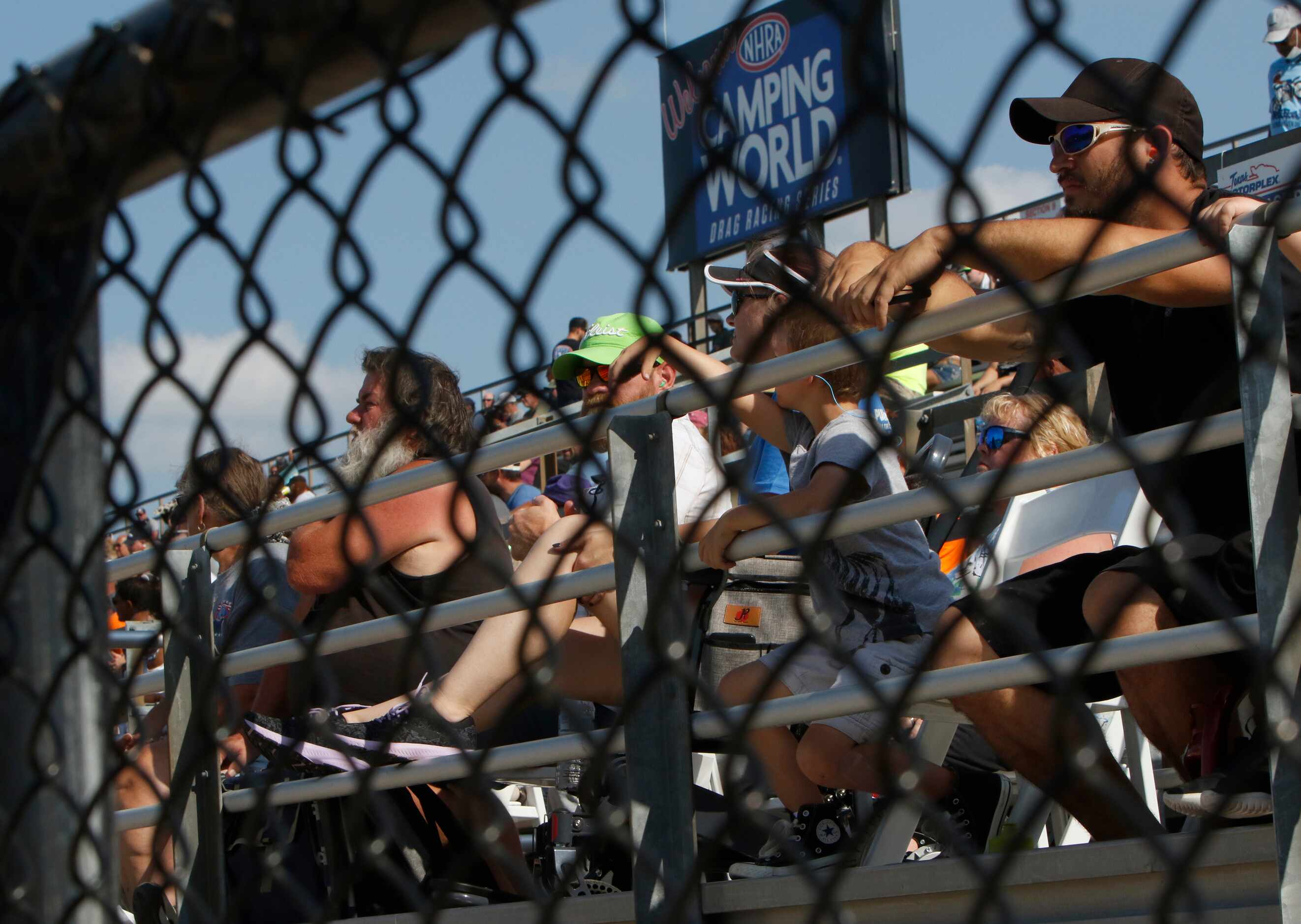 Racing fans pack the stands to soak up the sun and NHRA racing. The final day of the AAA...