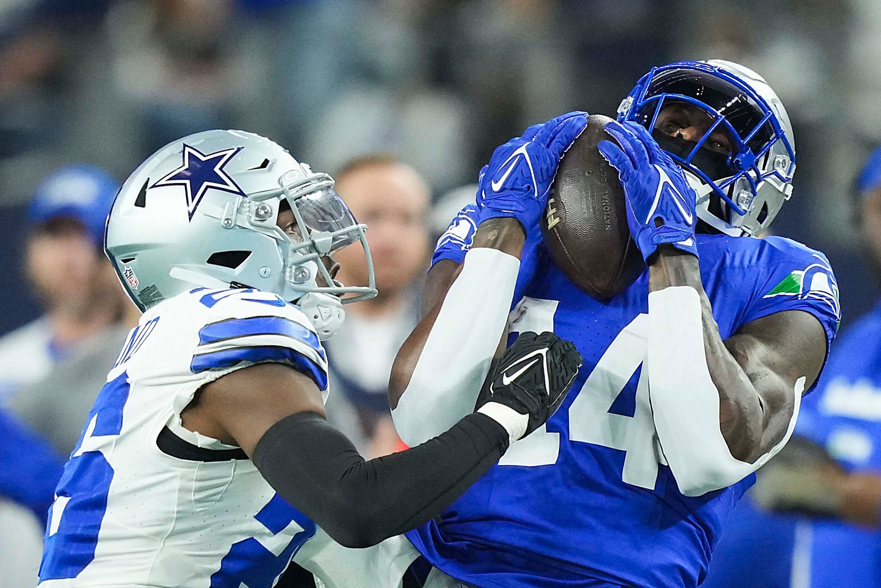 Seattle Seahawks wide receiver DK Metcalf (14) catches a pass as Dallas Cowboys cornerback...