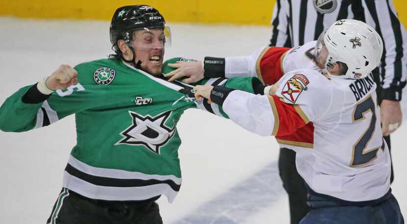 Dallas Stars right wing Brett Ritchie (25) fights with Florida Panthers center Connor...