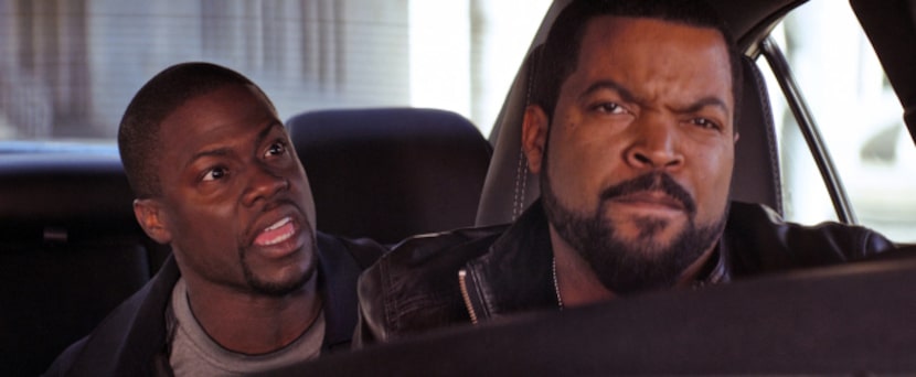 This image released by Universal Pictures shows Ice Cube, right, and Kevin Hart in a scene...