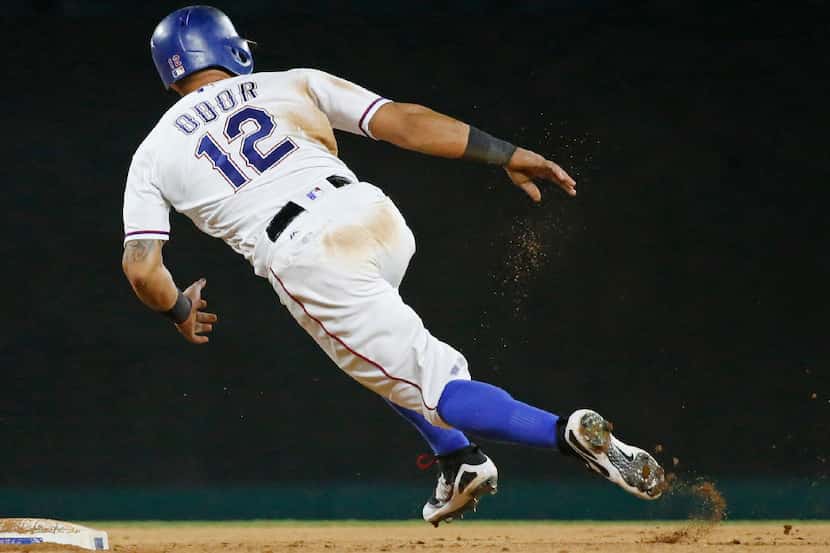 Texas Rangers second baseman Rougned Odor (12) motors around second base during the Detroit...