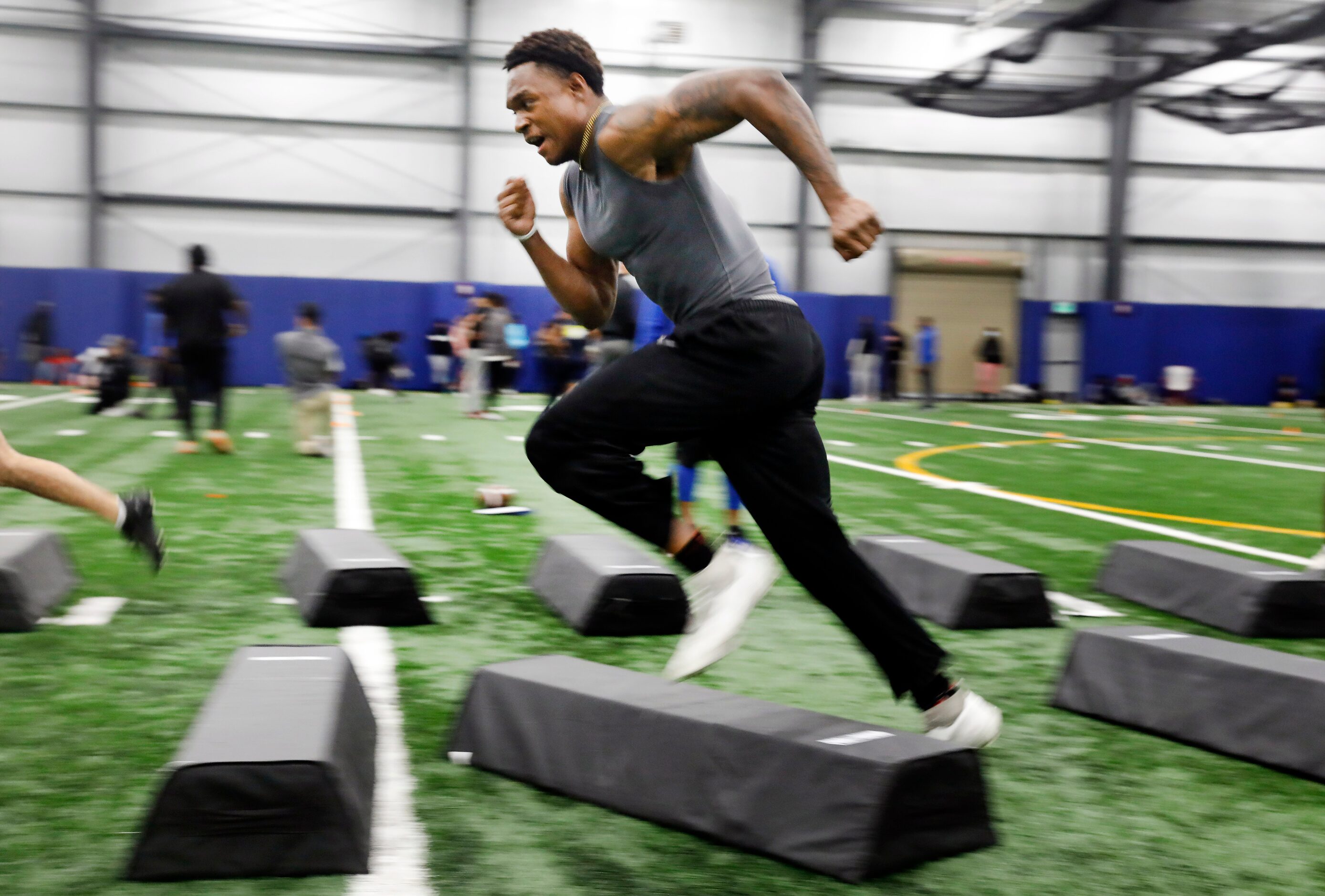 Unsigned senior Le’Darrion Davis of Richardson Berkner High School runs drills before...