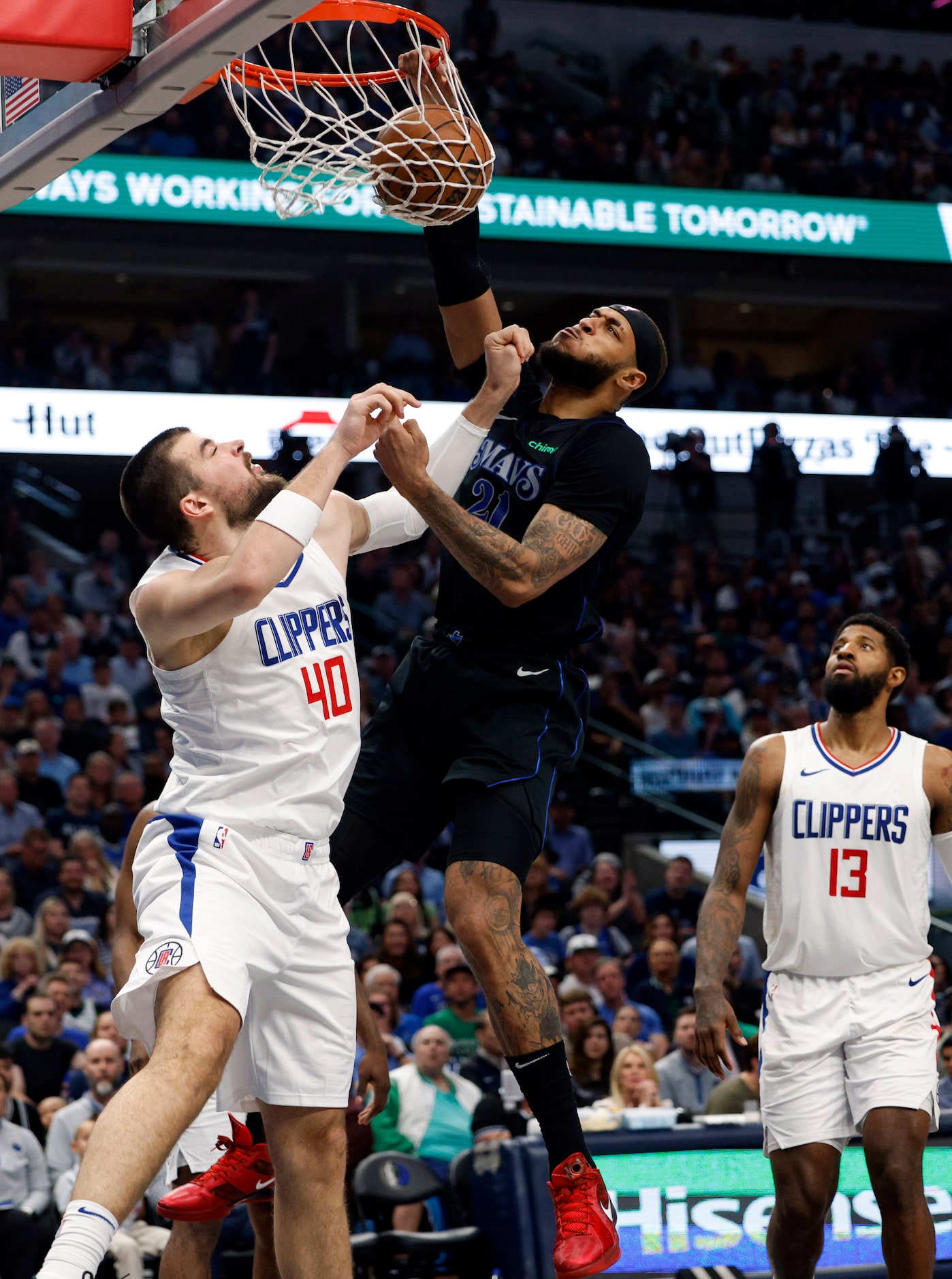 Dallas Mavericks center Daniel Gafford (21) dunks on LA Clippers center Ivica Zubac (40)...