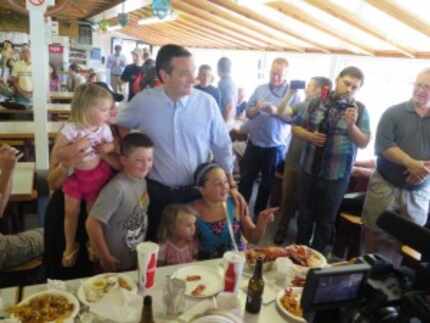  Sen. Ted Cruz works the crowd at Brown's Lobster Pound in Seabrook, N.H., on Sunday....