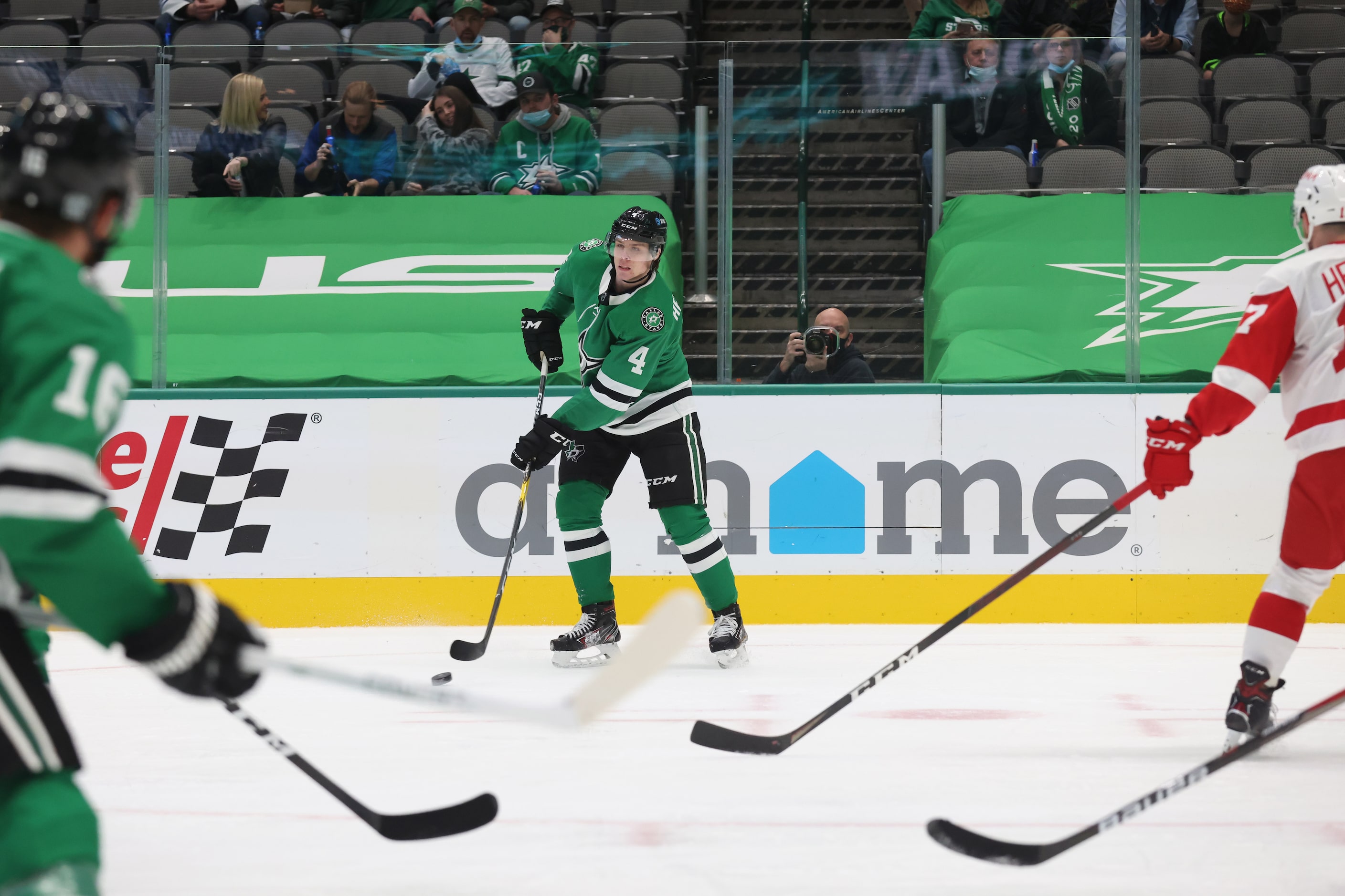 Dallas Stars defenseman Miro Heiskanen (4) looks to pass in a game against the Detroit Red...